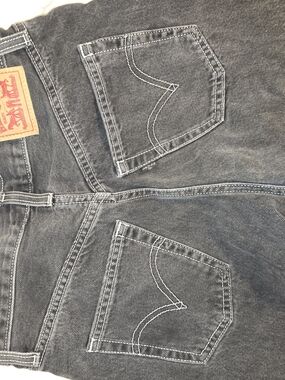 Relaxed Black Women's Jeans with Whipstitch Pocket Detail